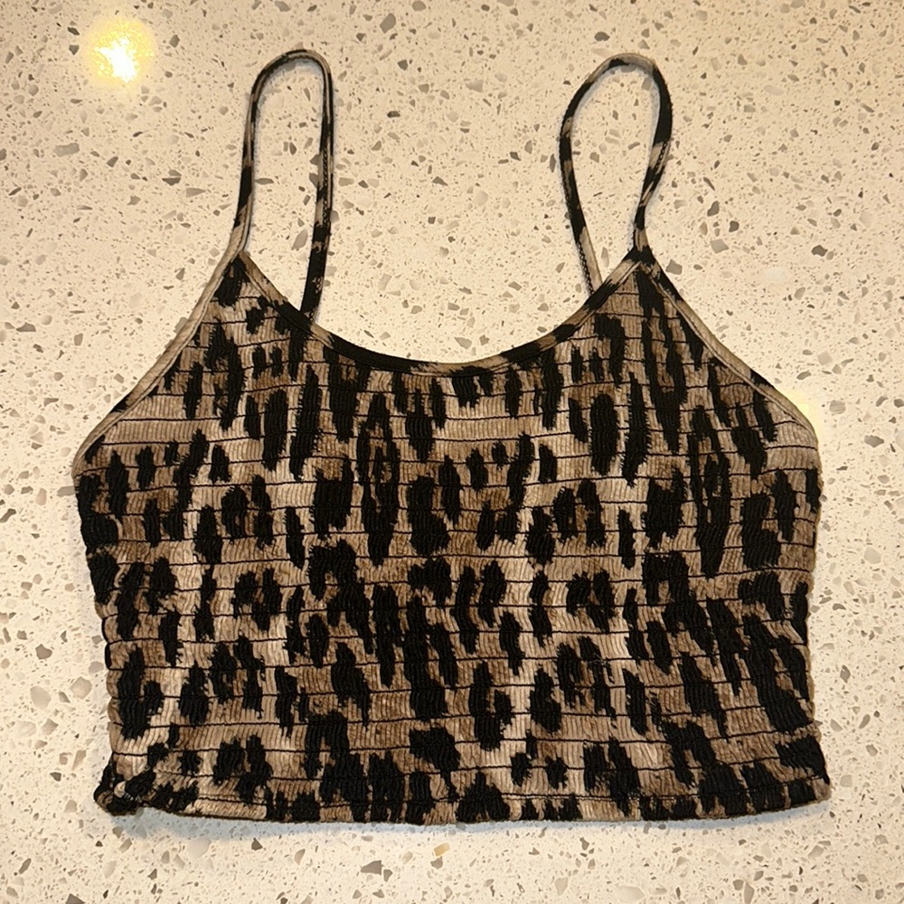 Super crop, stretchy cheetah print tank top.